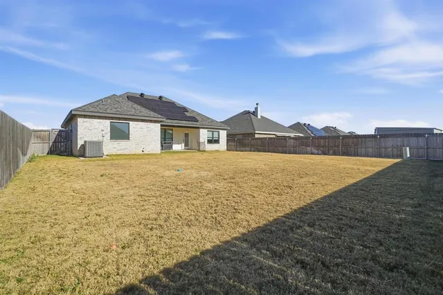 a front view of a house with a ocean view
