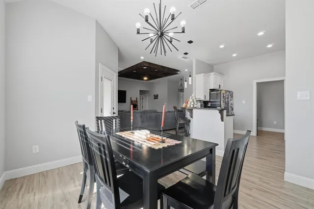 a view of a dining room with furniture