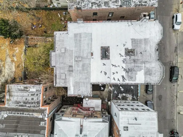 a picture of a bathroom with a sink and mirror
