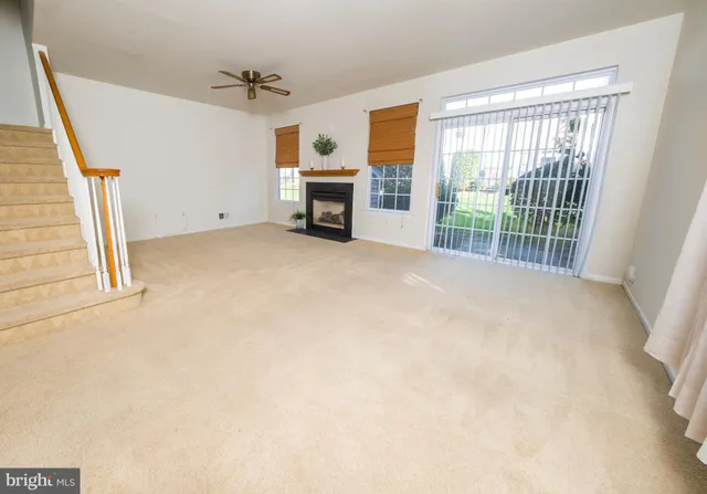 a view of livingroom with furniture and fireplace
