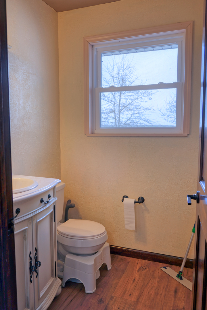 3992 Neunert Road Jacob, IL 62950 - Photo 16 of 48 a white toilet sitting next to a window