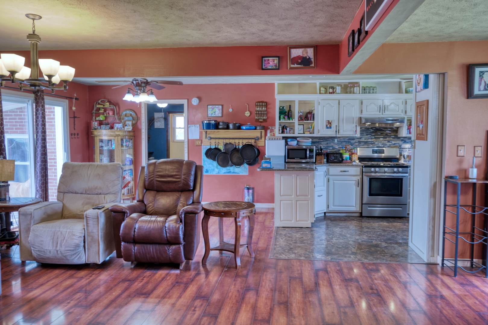 3992 Neunert Road Jacob, IL 62950 - Photo 6 of 48 a living room with stainless steel appliances granite countertop furniture wooden floor and view kitchen