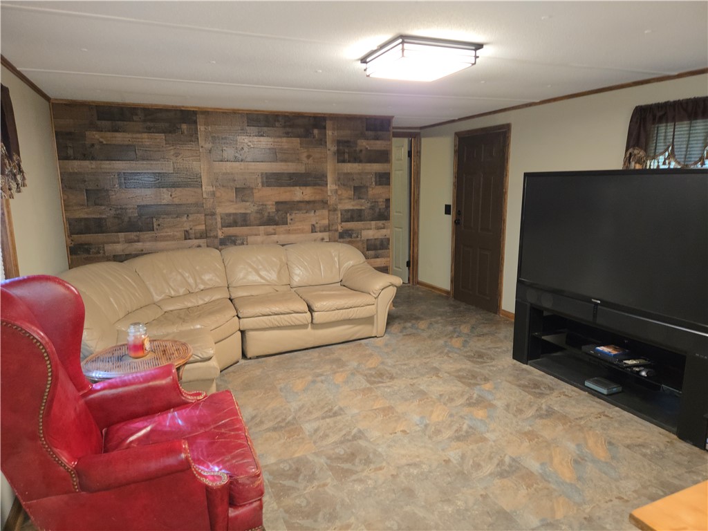 238 Forest Lane Starr, SC 29684 - Photo 5 of 11 Comfortable living space featuring distinctive plank accent wall.