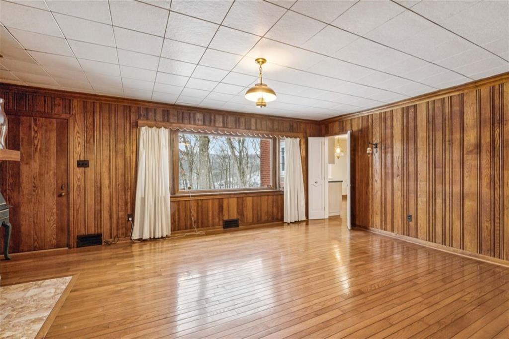 2508 Woodbine Road Aliquippa, PA 15001 - Photo 18 of 46 a view of an empty room with a window