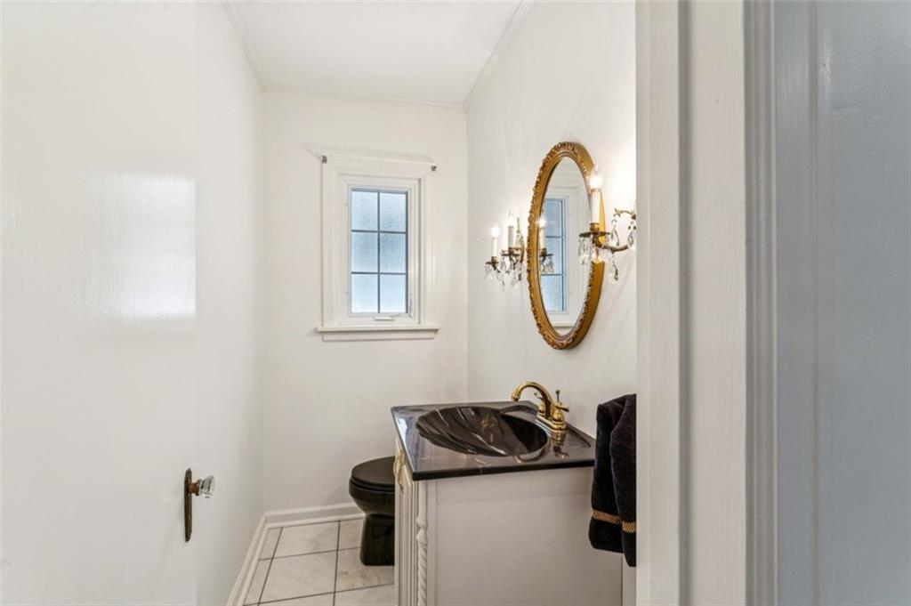 2508 Woodbine Road Aliquippa, PA 15001 - Photo 19 of 46 a bathroom with a bath tub and a sink