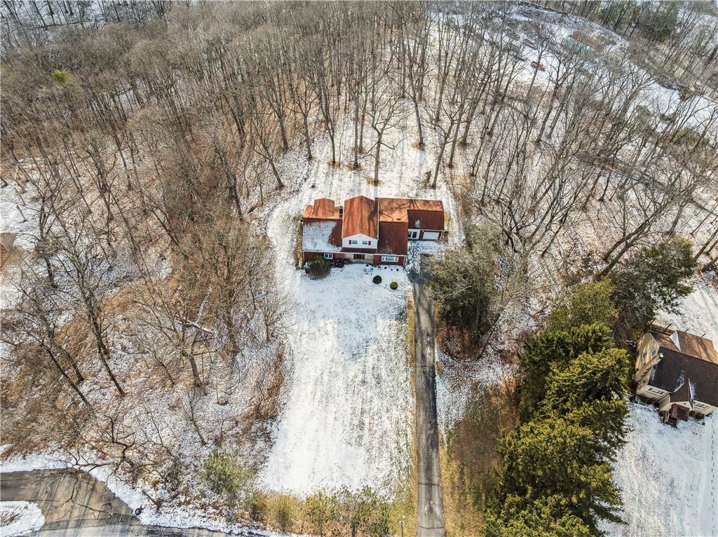 2508 Woodbine Road Aliquippa, PA 15001 - Photo 2 of 46 a view of house with trees in front of it