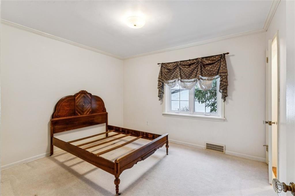 2508 Woodbine Road Aliquippa, PA 15001 - Photo 23 of 46 a living room with a couch and window