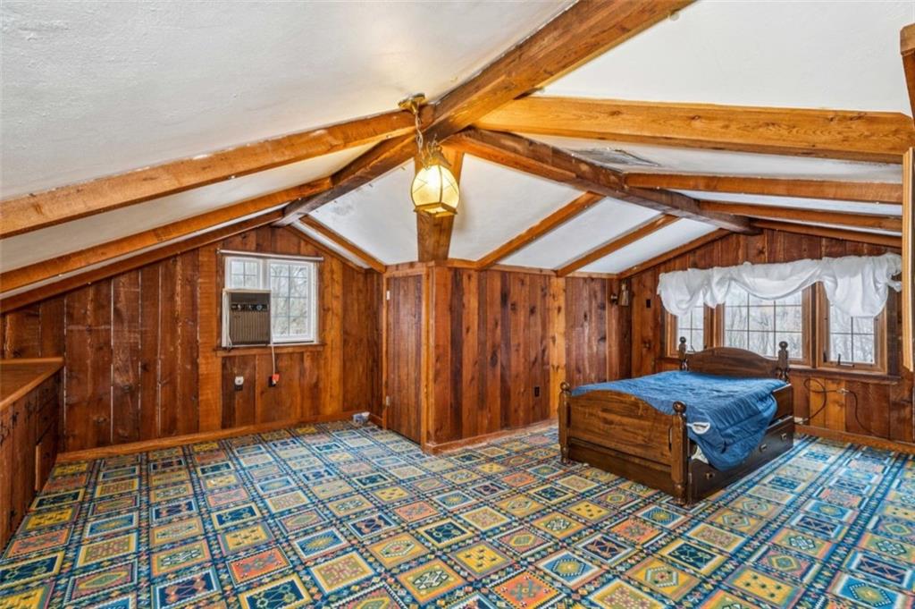 2508 Woodbine Road Aliquippa, PA 15001 - Photo 28 of 46 a bedroom with a bed and a mirror