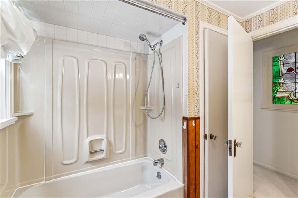 2508 Woodbine Road Aliquippa, PA 15001 - Photo 31 of 46 a bathroom with a shower and a tub