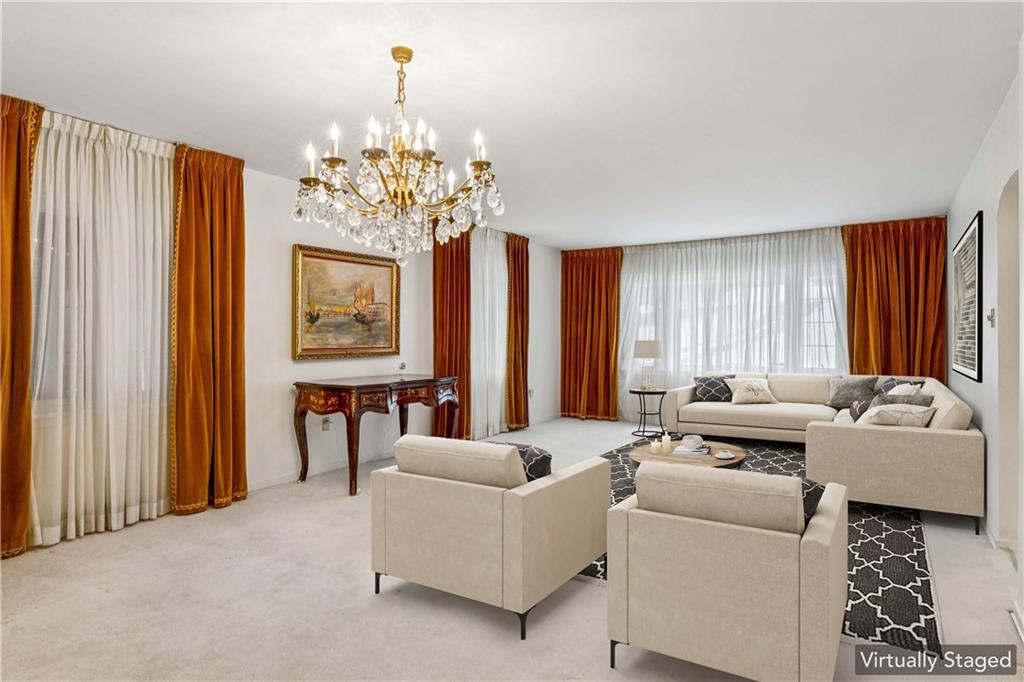2508 Woodbine Road Aliquippa, PA 15001 - Photo 4 of 46 a living room with furniture and a chandelier