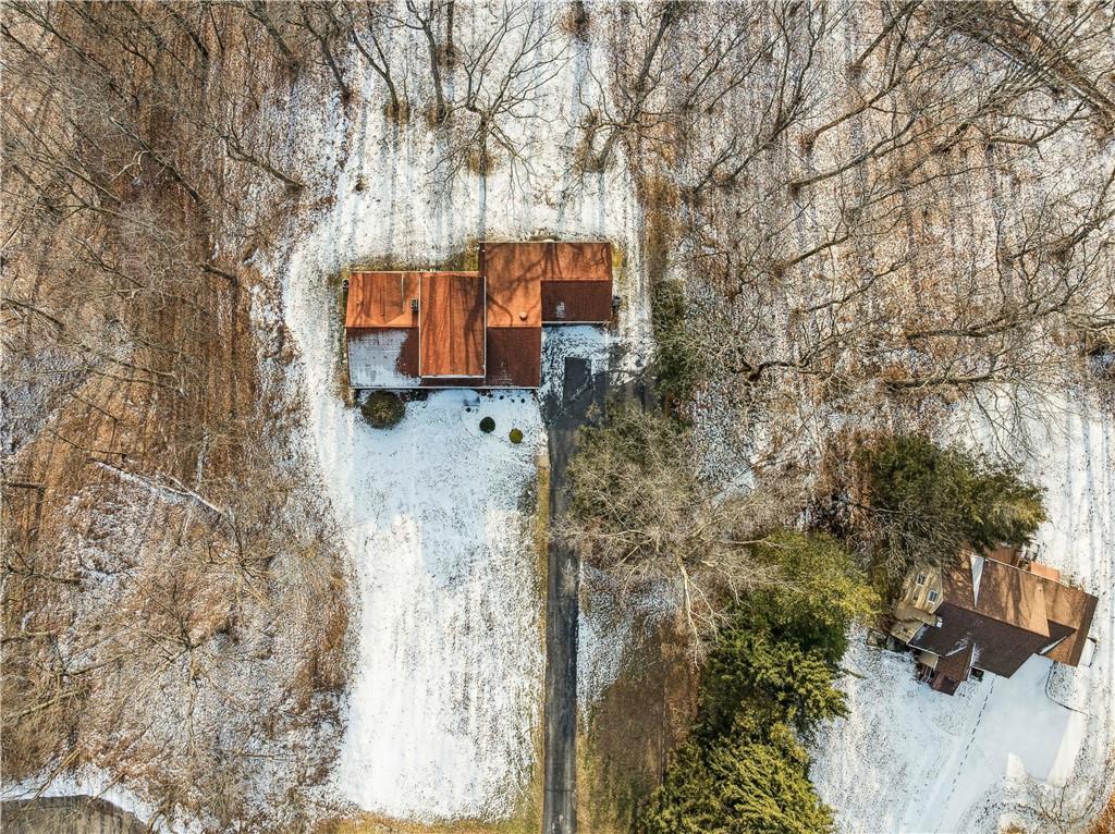 2508 Woodbine Road Aliquippa, PA 15001 - Photo 43 of 46 a backyard of a house with lots of green space