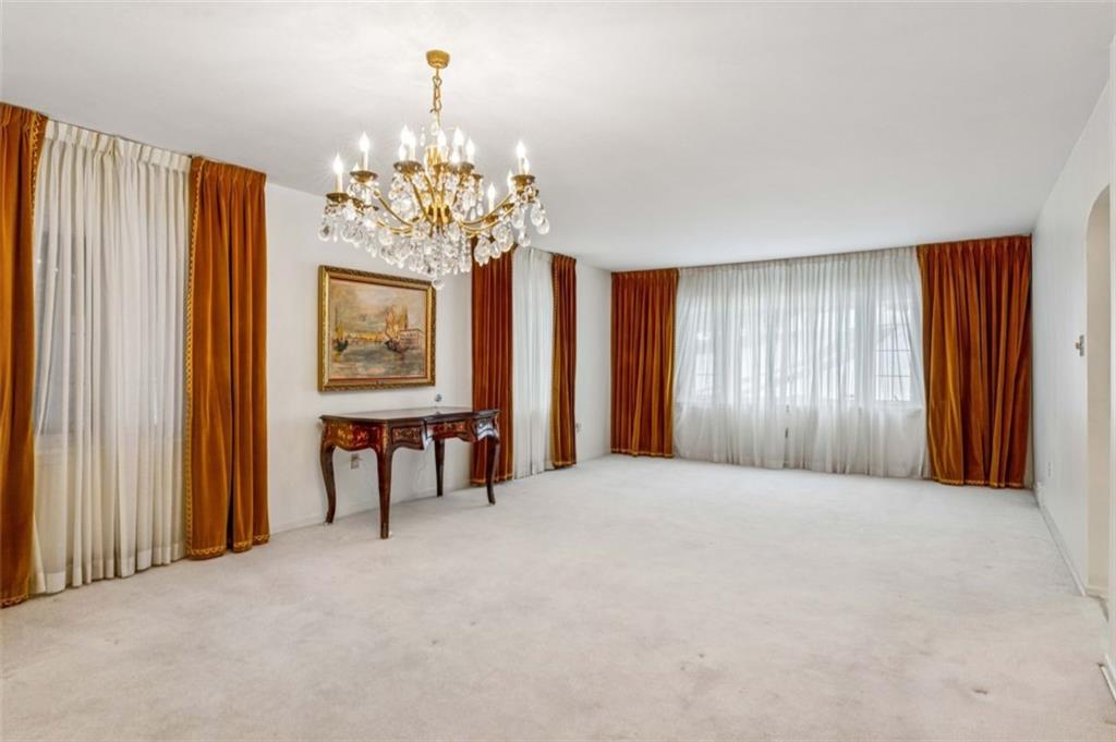 2508 Woodbine Road Aliquippa, PA 15001 - Photo 5 of 46 a view of an empty room with window and furniture