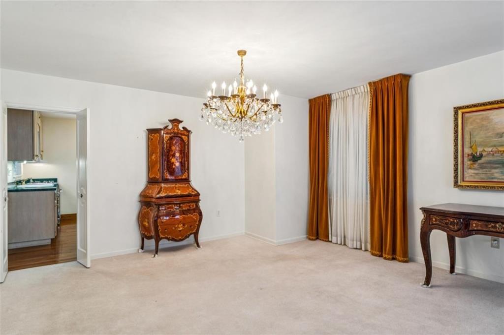 2508 Woodbine Road Aliquippa, PA 15001 - Photo 7 of 46 a dining room with furniture and chandelier