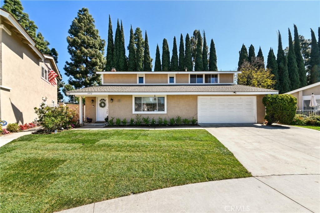 3972 Hendrix Street Irvine, CA 92614 - Photo 2 of 3 a front view of a house with garden