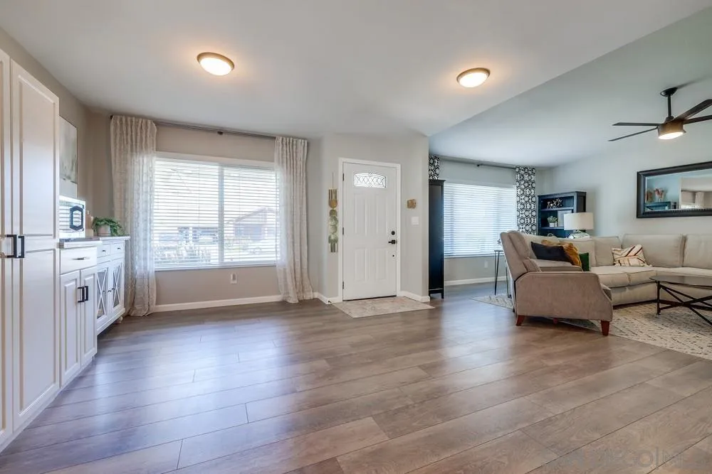 10262 Molino Road Santee, CA 92071 - Photo 11 of 26 a living room with furniture and a large window