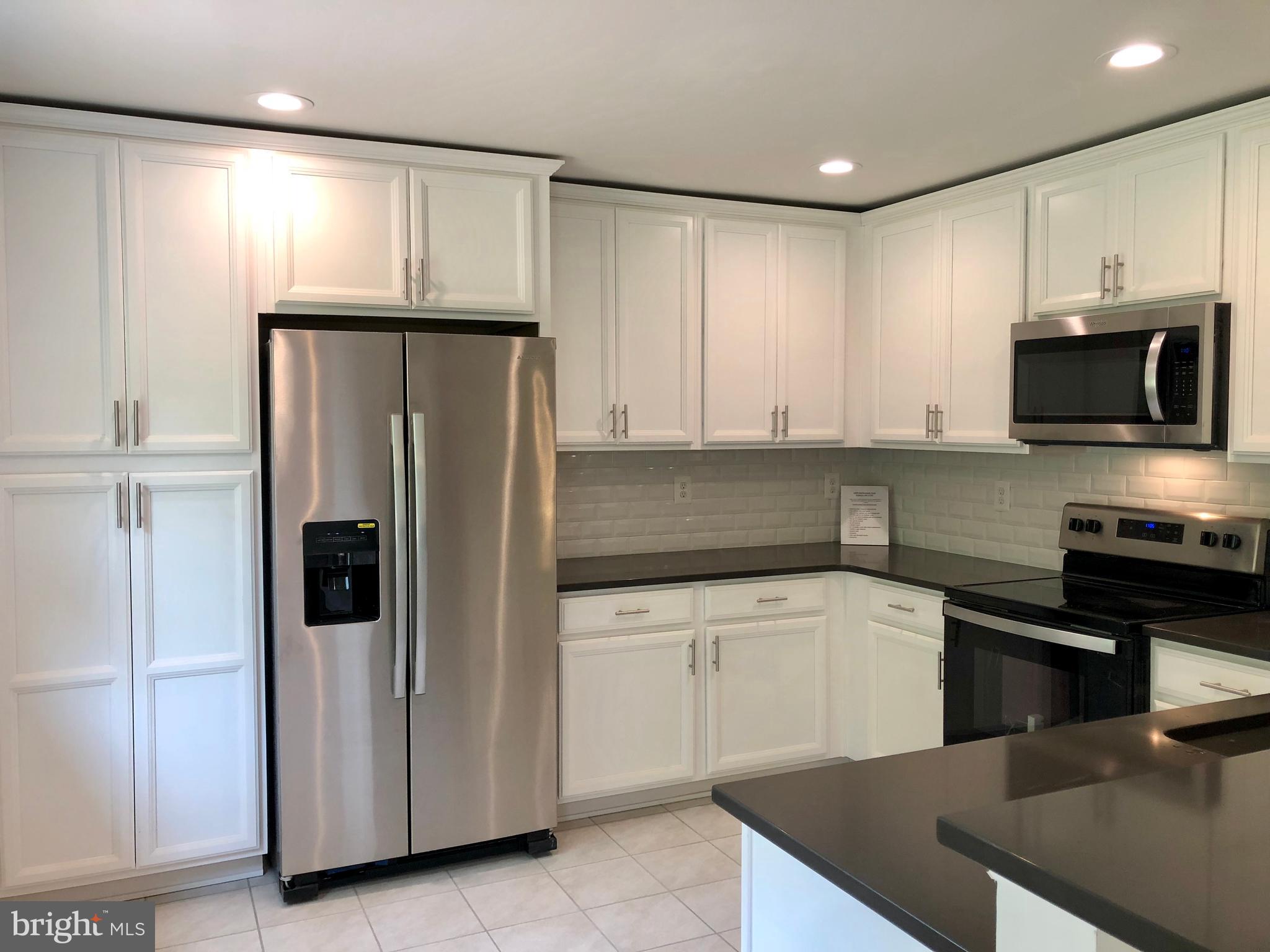 10826 Old Annapolis Road Frederick, MD 21701 - Photo 3 of 23 DESIGNER KITCHEN WITH NEW CABINETRY AND QUARTZ TOP
