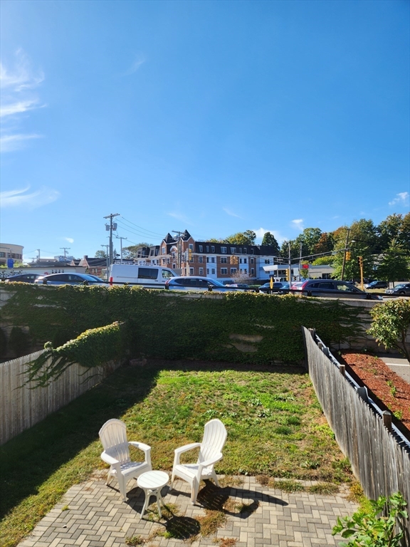 321 East Street Dedham, MA 02026 - Photo 17 of 18 a view of a lake with a city