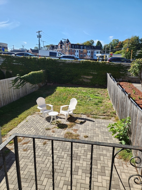 321 East Street Dedham, MA 02026 - Photo 18 of 18 a view of a lake with a deck in the background