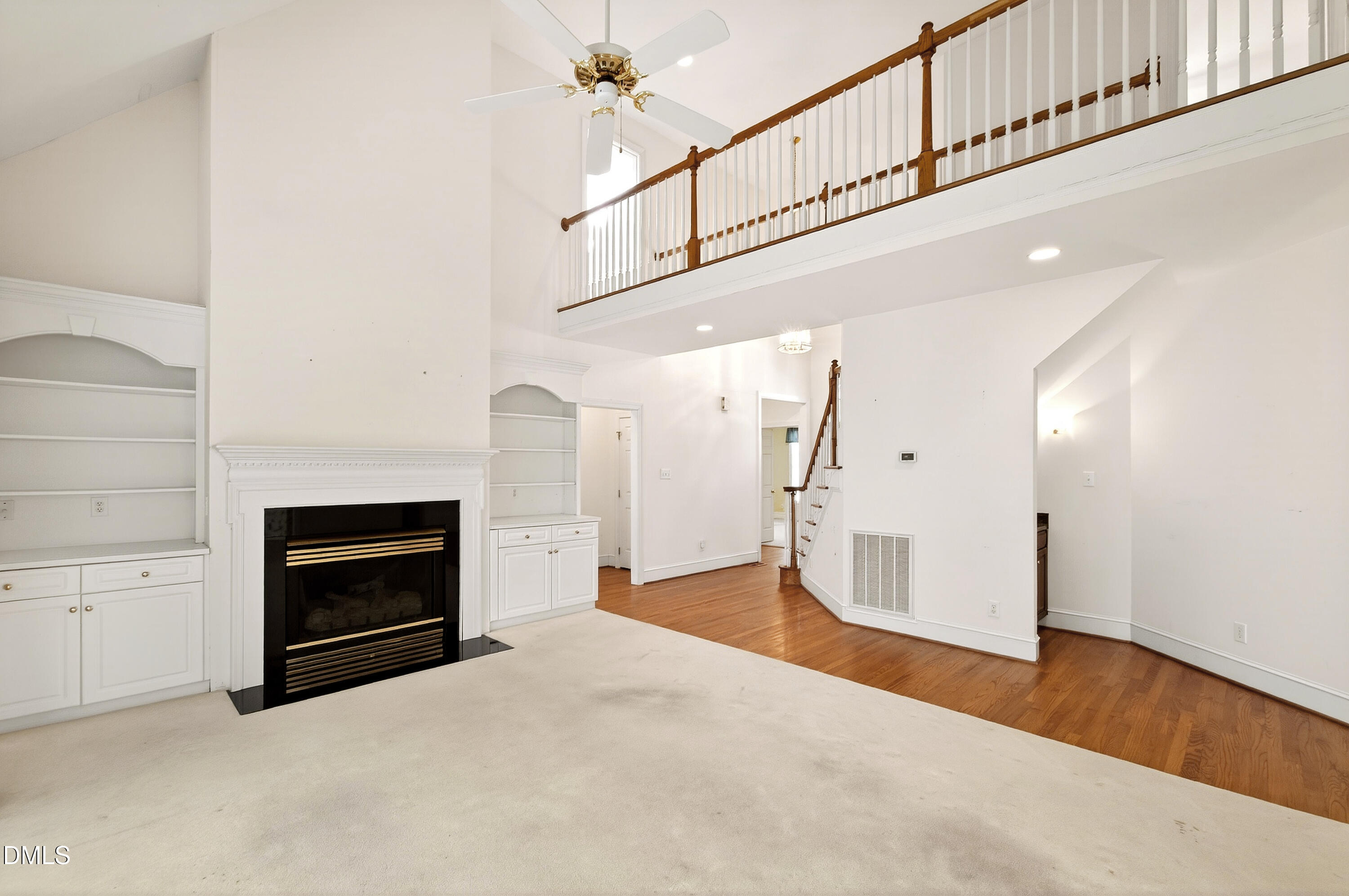 913 Tanworth Drive Raleigh, NC 27615 - Photo 11 of 48 a view of an empty room and fire place