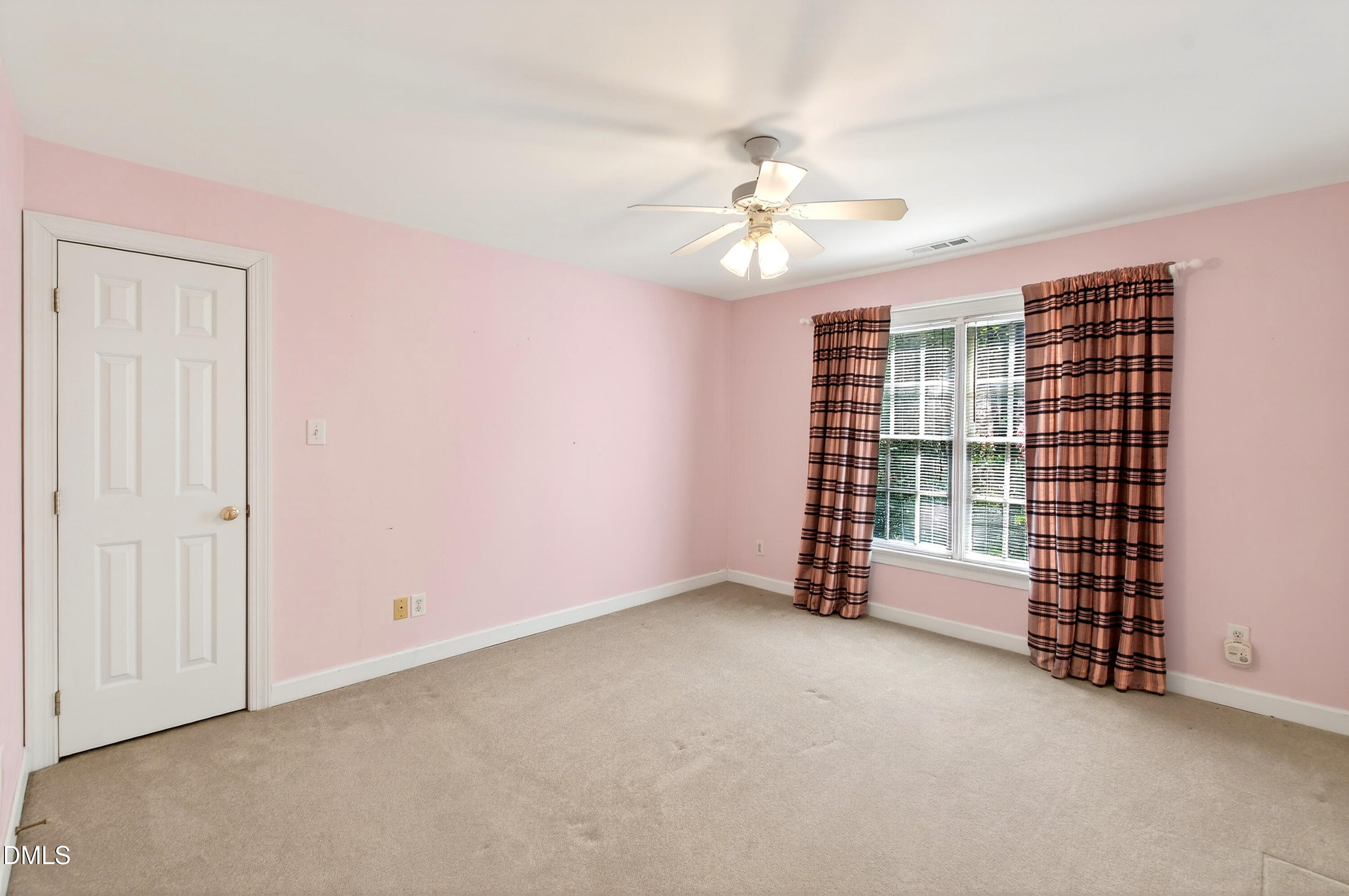913 Tanworth Drive Raleigh, NC 27615 - Photo 31 of 48 an empty room with windows and fan
