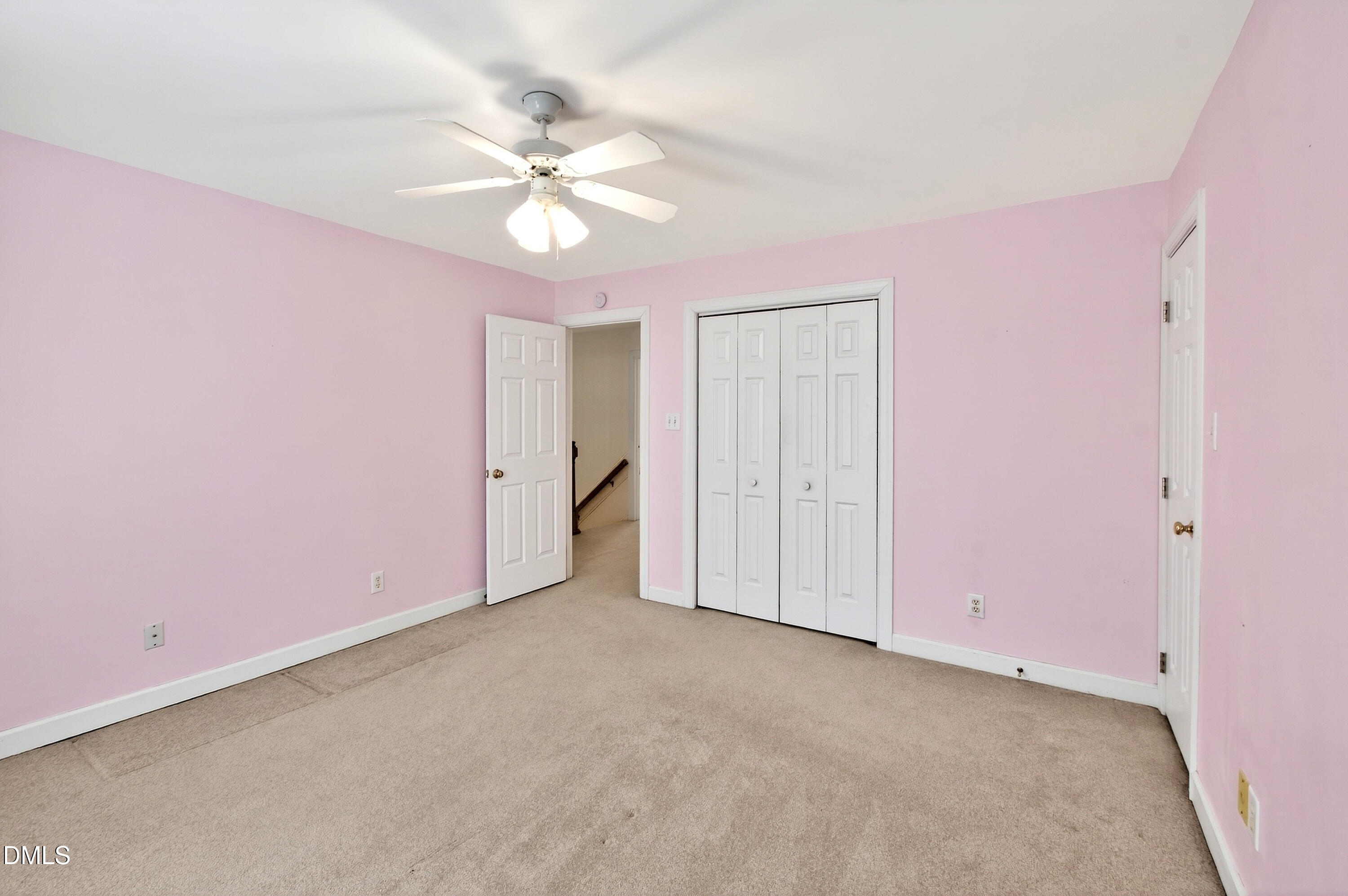 913 Tanworth Drive Raleigh, NC 27615 - Photo 32 of 48 a view of an empty room with a fan