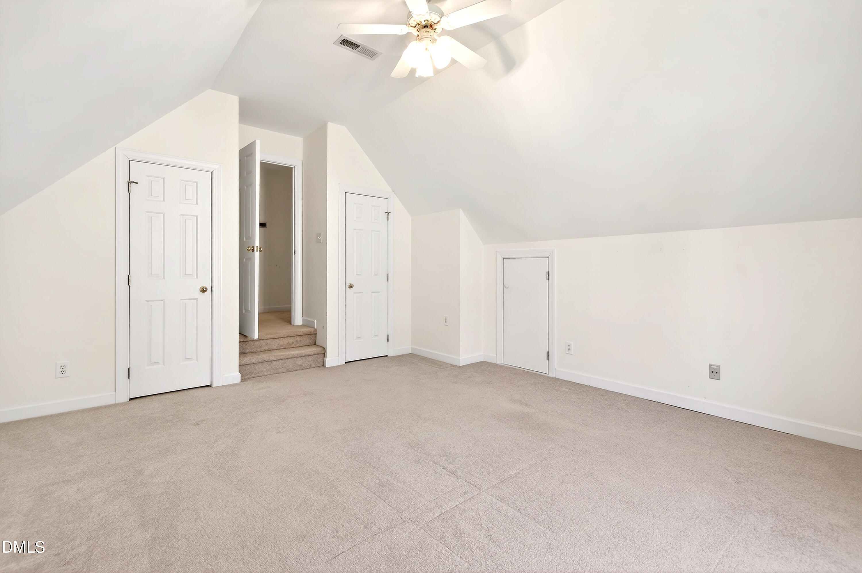 913 Tanworth Drive Raleigh, NC 27615 - Photo 34 of 48 an empty room with a ceiling fan and window