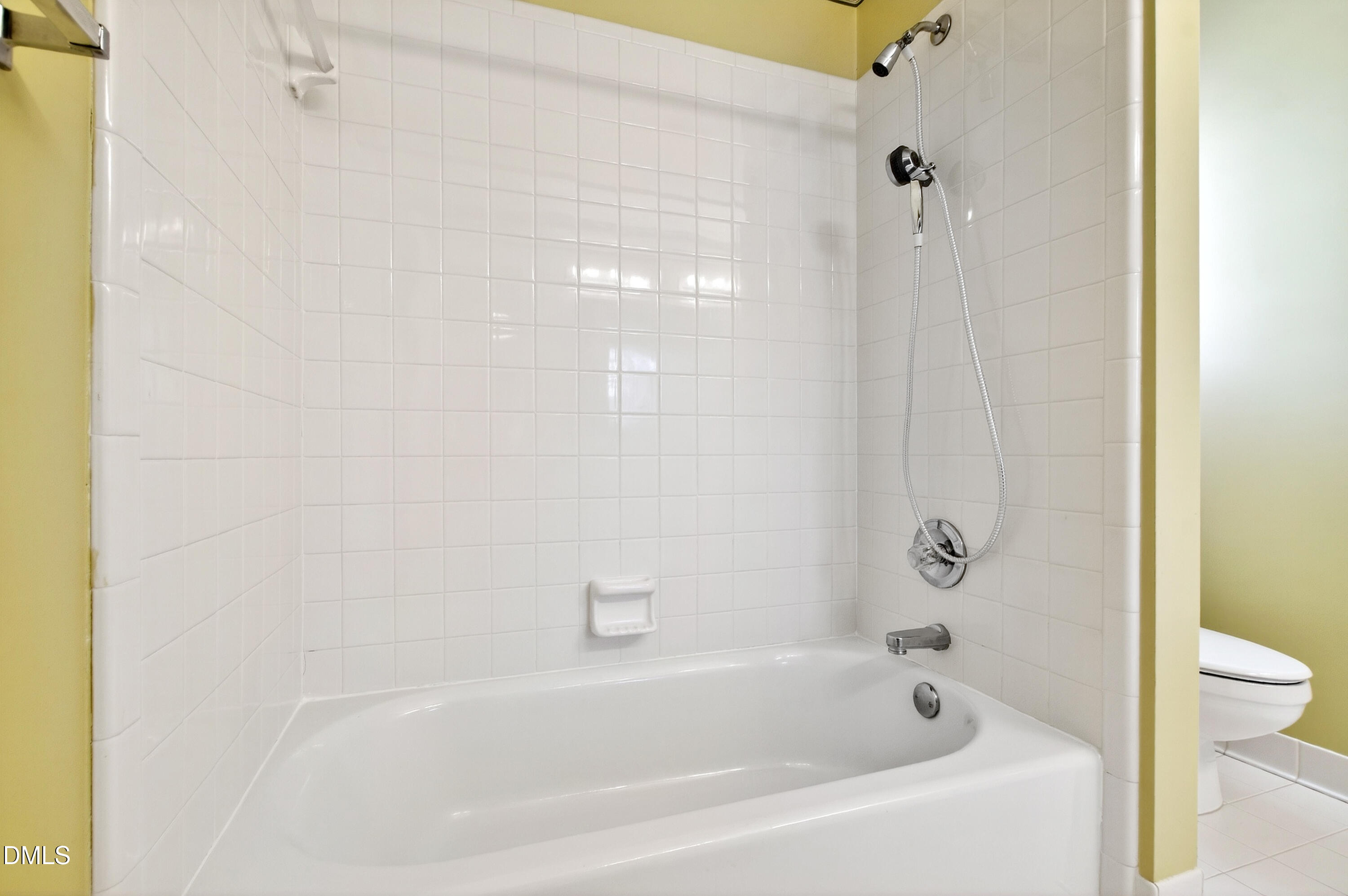 913 Tanworth Drive Raleigh, NC 27615 - Photo 36 of 48 a bathroom with a bathtub