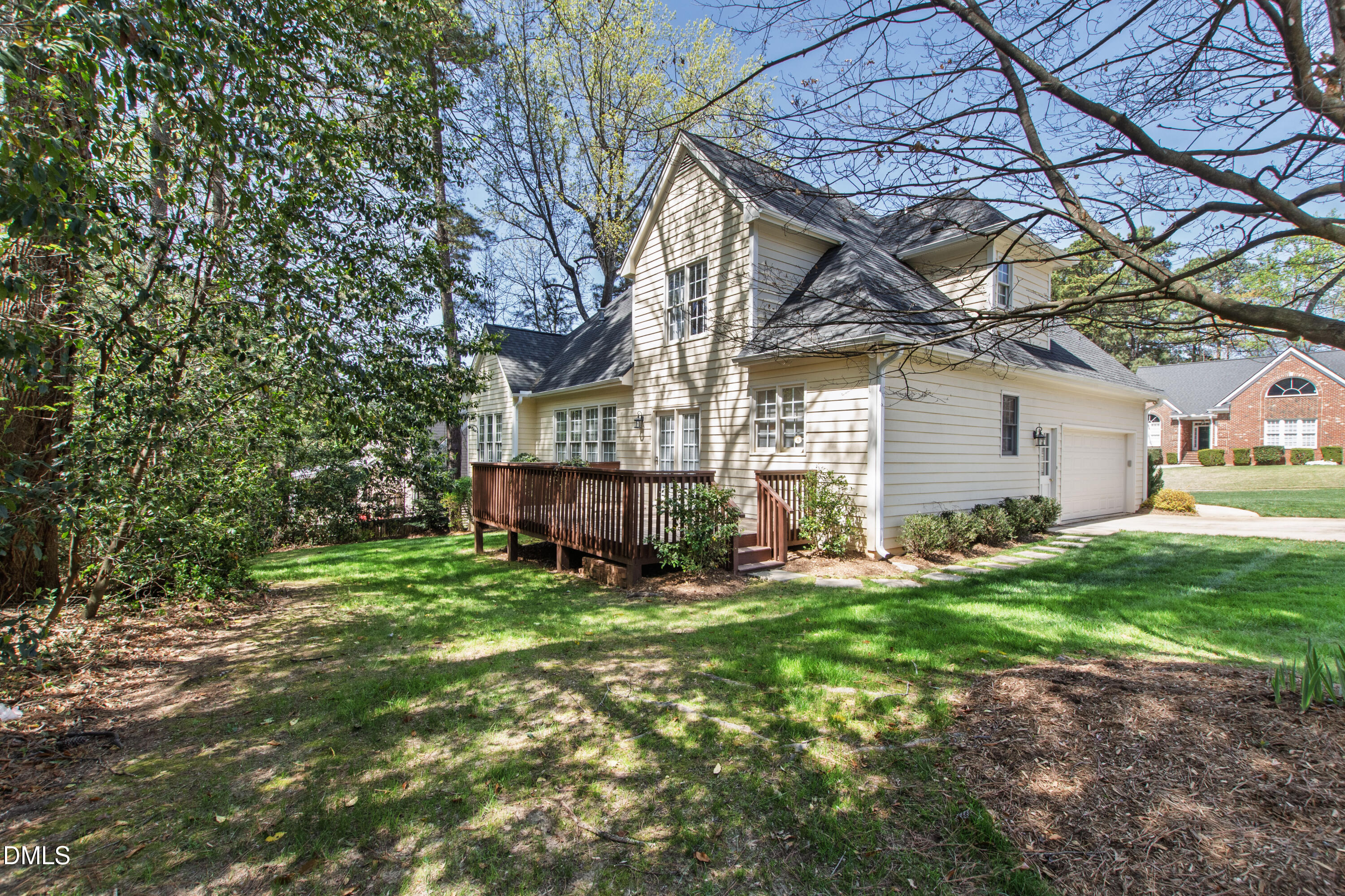 913 Tanworth Drive Raleigh, NC 27615 - Photo 44 of 48 a view of a house with a yard