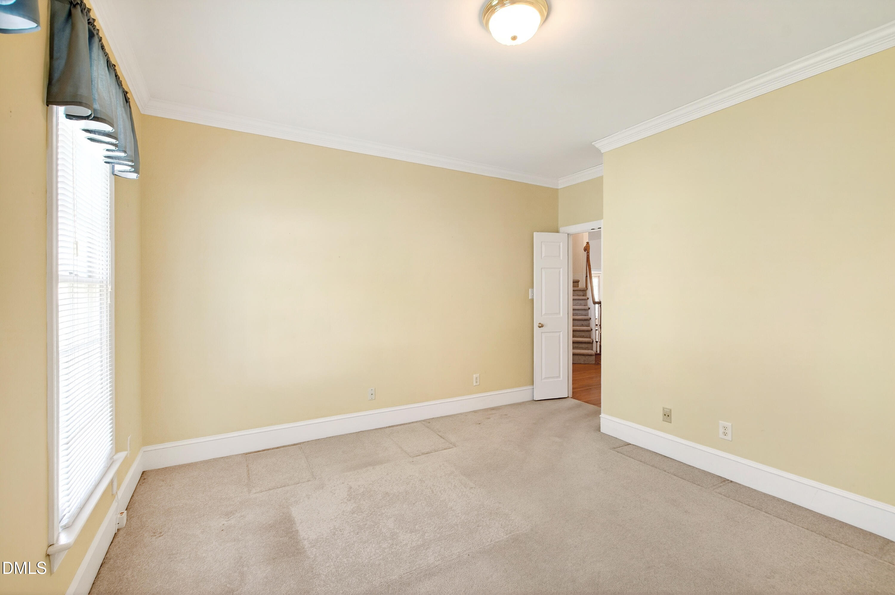 913 Tanworth Drive Raleigh, NC 27615 - Photo 6 of 48 a view of an empty room
