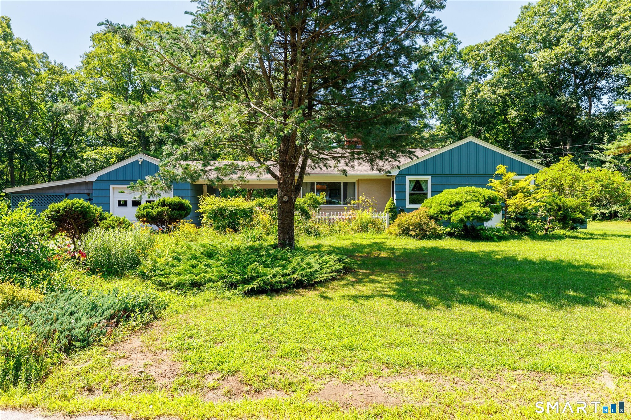 19 Beckwith Street Killingly, CT 06239 - Photo 4 of 39 a front view of a house with a yard