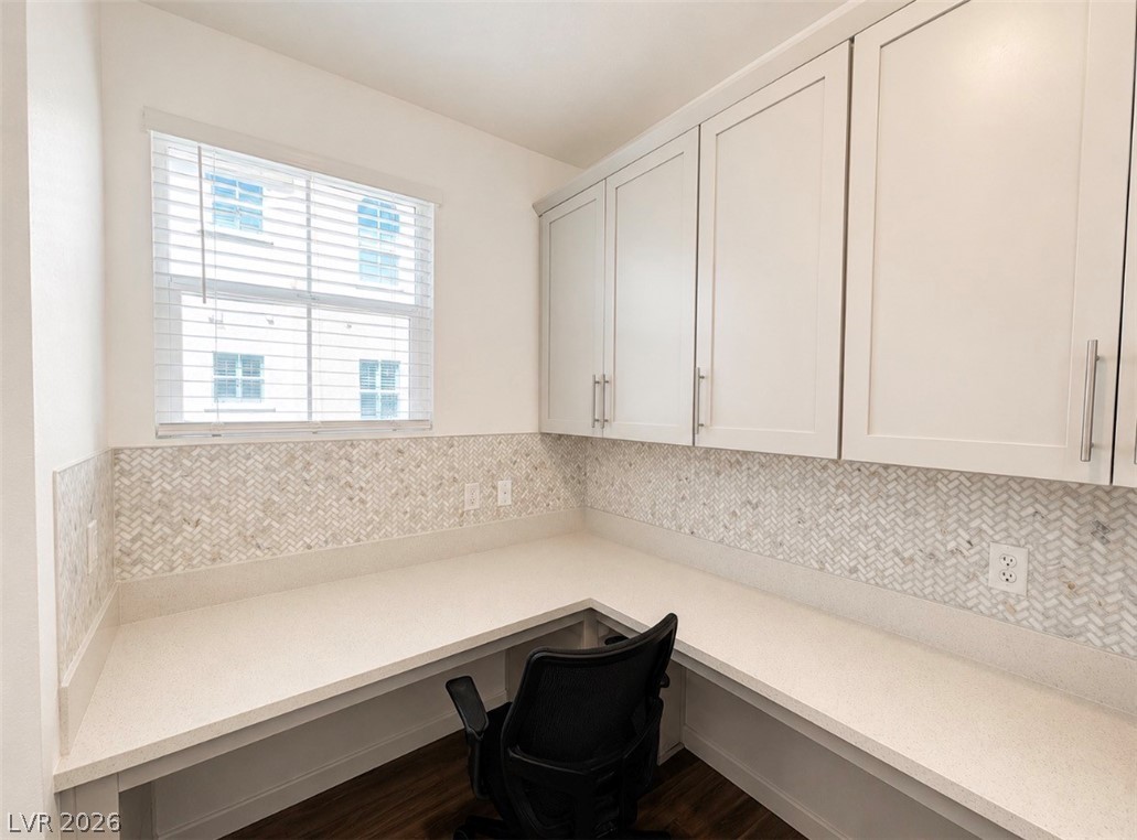 2555 Hampton Road, Unit 4205 Henderson, NV 89052 - Photo 13 of 52 This bright office space features extensive built-in cabinetry and ample counter space, perfect for productivity.