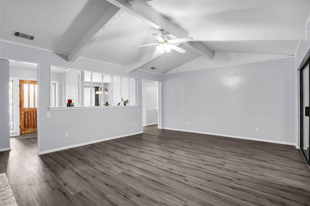 1327 Big Stone Gap Road Duncanville, TX 75137 - Photo 11 of 36 a view of a kitchen with wooden floor and a kitchen space