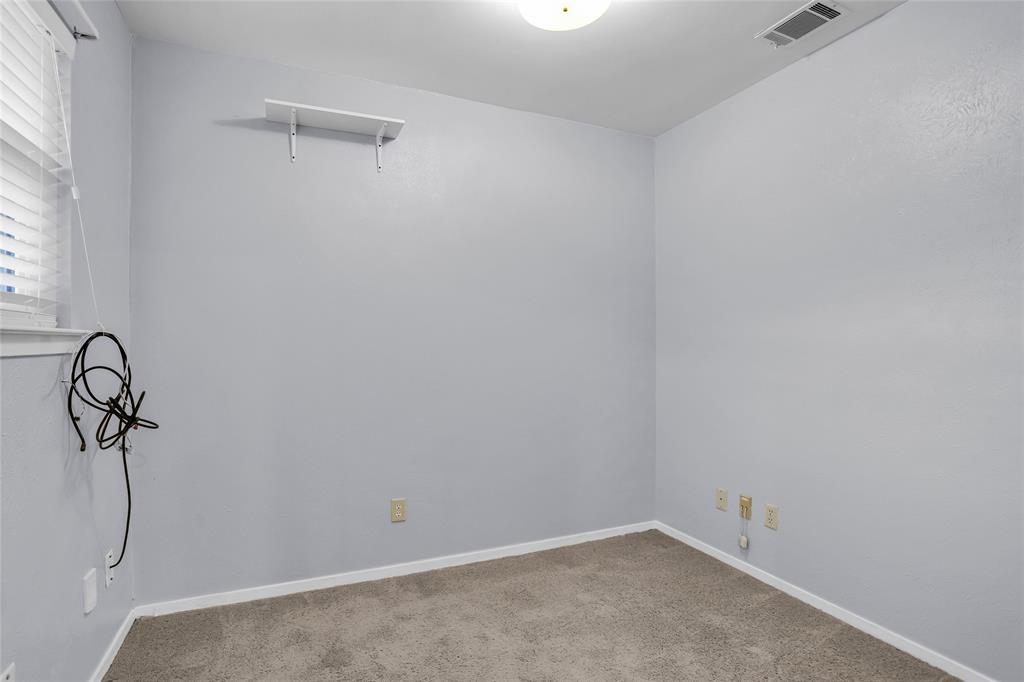 1327 Big Stone Gap Road Duncanville, TX 75137 - Photo 13 of 36 a view of small space with racks on the wall