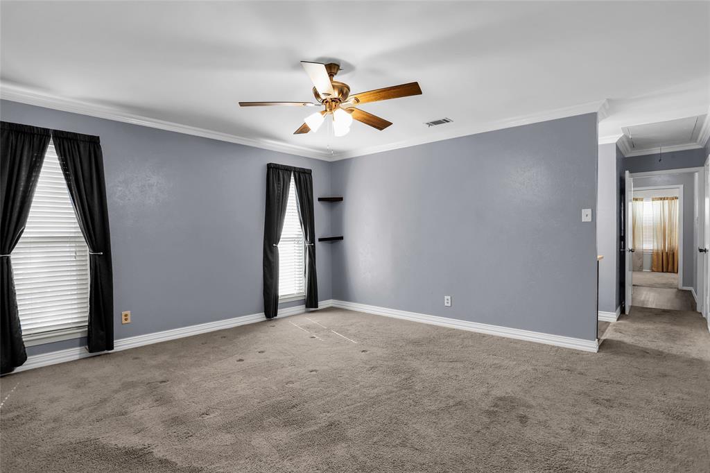 1327 Big Stone Gap Road Duncanville, TX 75137 - Photo 29 of 36 a view of an empty room with a ceiling fan