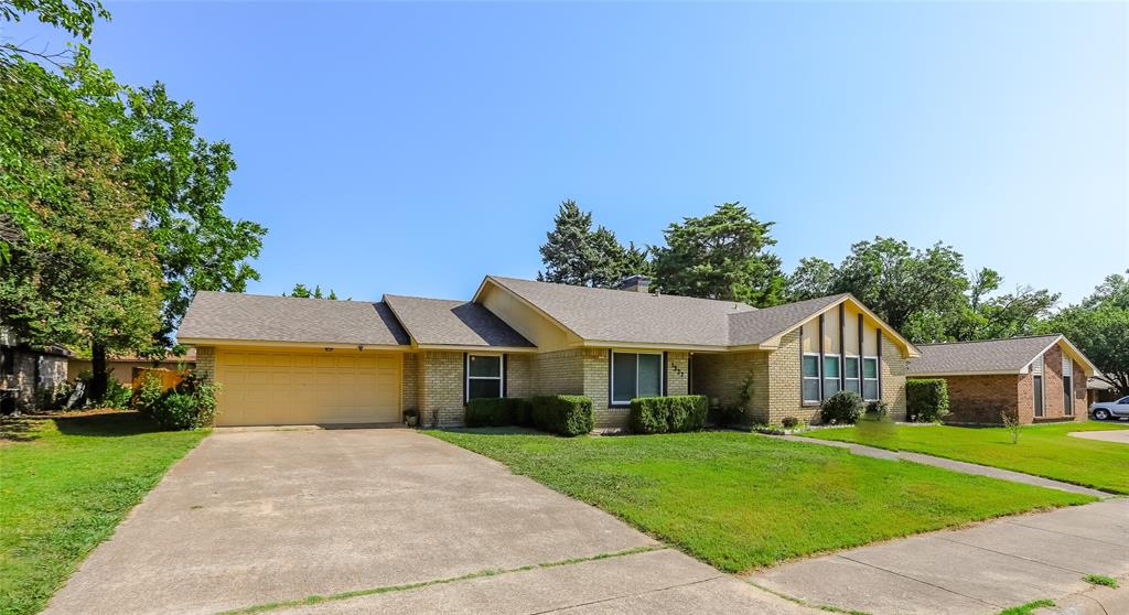 1327 Big Stone Gap Road Duncanville, TX 75137 - Photo 3 of 36 a front view of a house with a yard