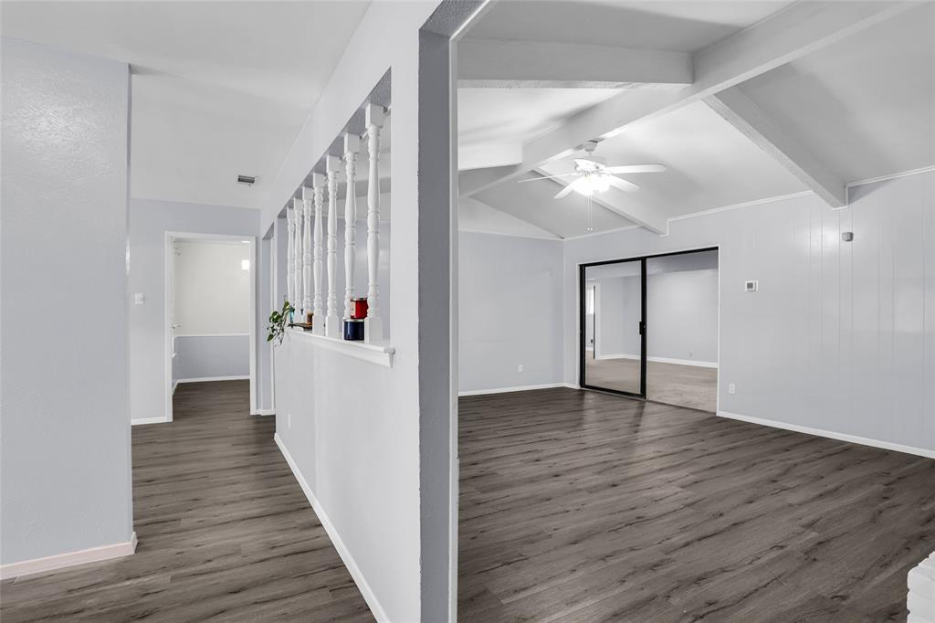 1327 Big Stone Gap Road Duncanville, TX 75137 - Photo 4 of 36 a view of a hallway with wooden floor