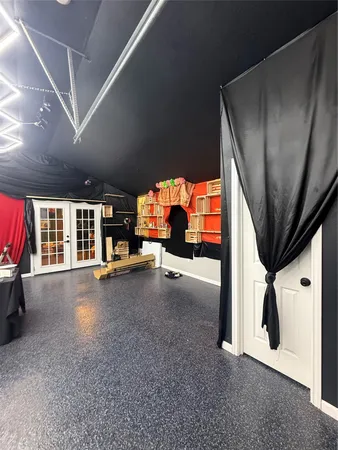 a view of a storage room with chairs
