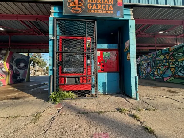 a sign on the side of a street