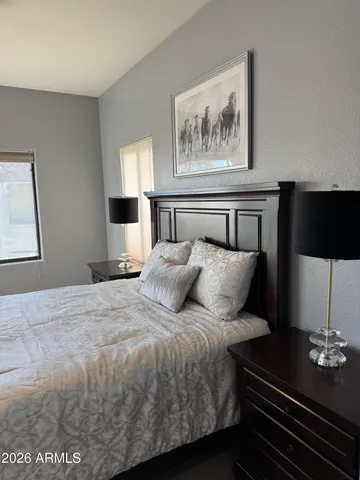 a house that has a tree in front of the house