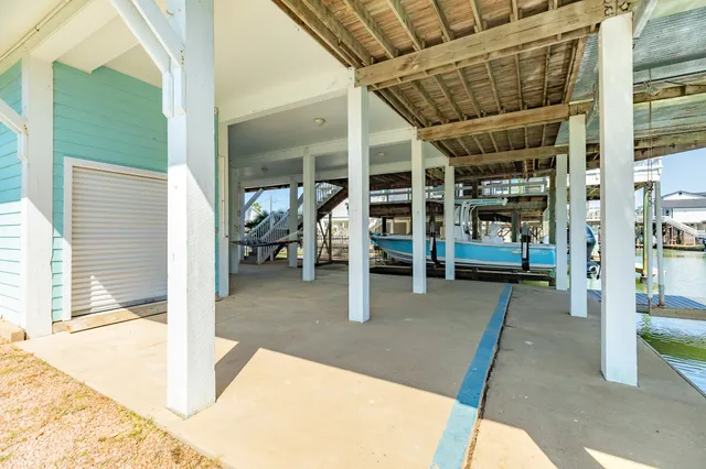 a swimming pool with outdoor seating and yard