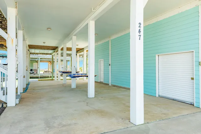 a view of living room with furniture and a fireplace