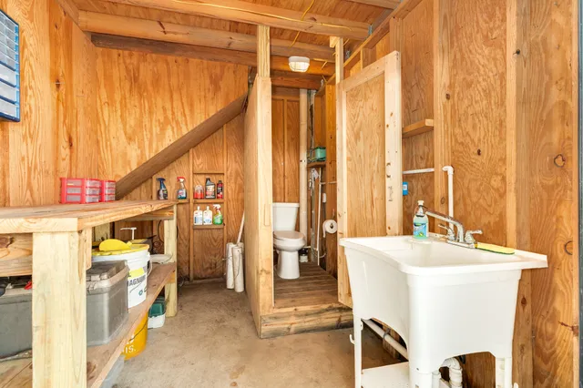 a room with stairs and windows