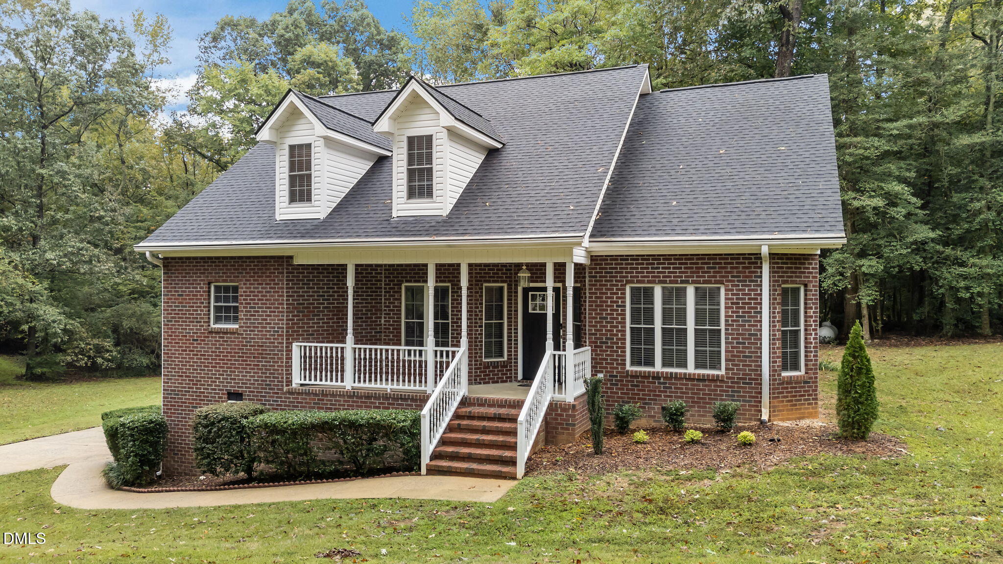 208 Adams Court Clayton, NC 27520 - Photo 1 of 63 a front view of a house with a yard
