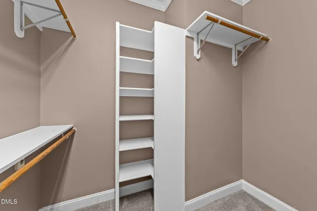 a view of a big room with wooden floor and staircase