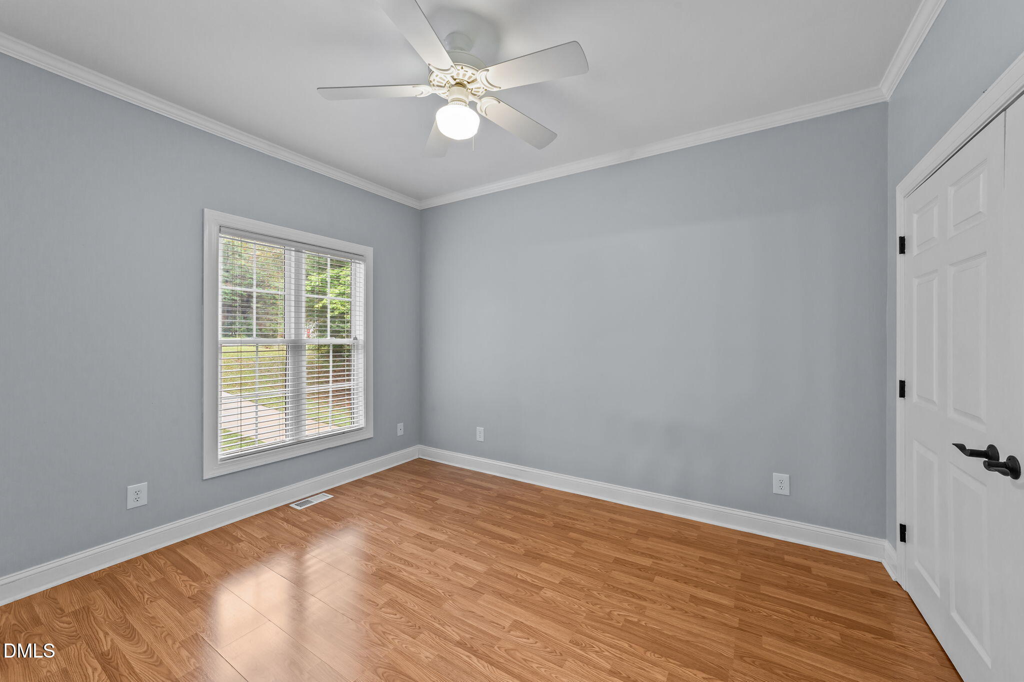 208 Adams Court Clayton, NC 27520 - Photo 30 of 63 a view of empty room with wooden floor and fan