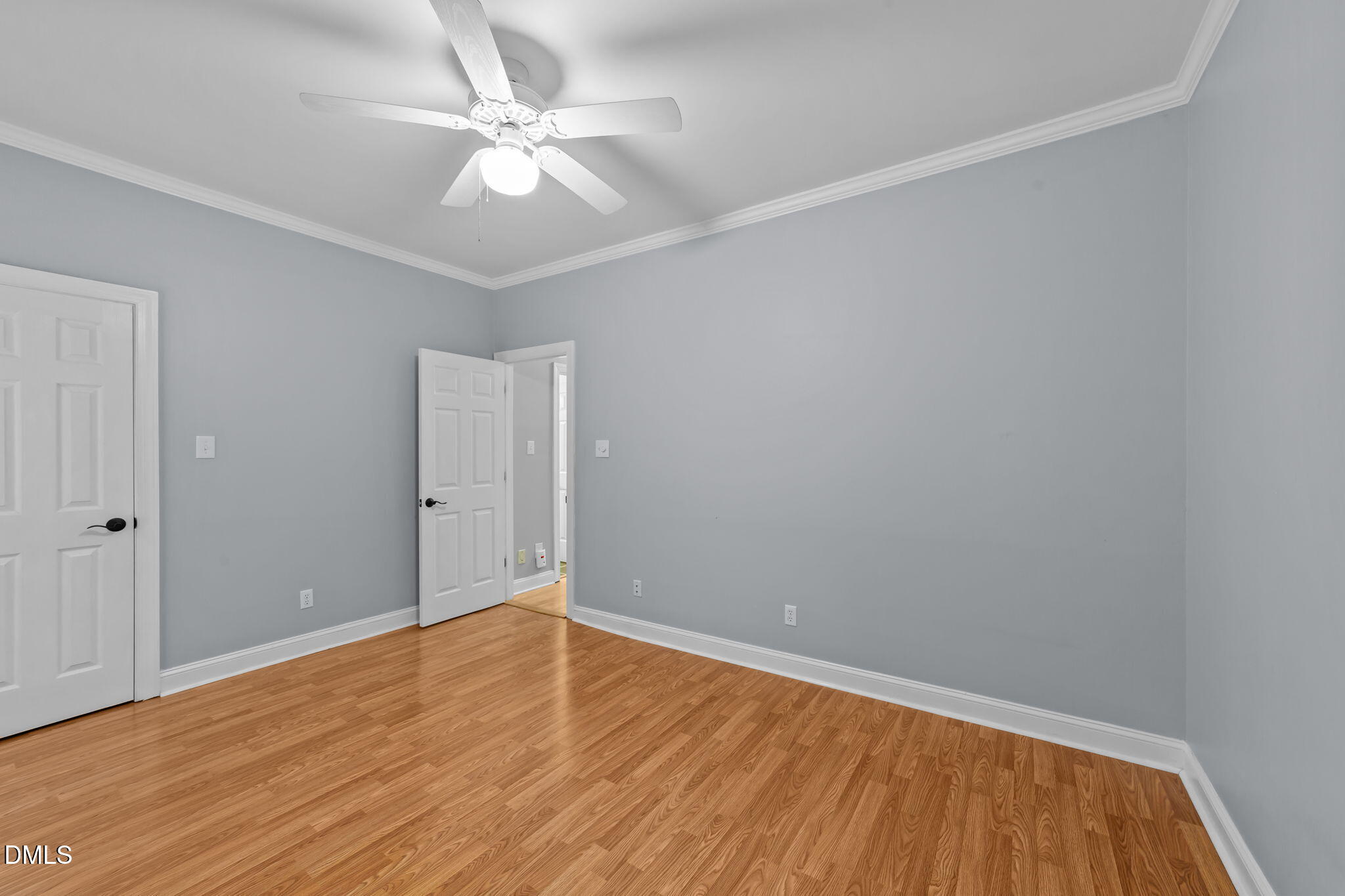 208 Adams Court Clayton, NC 27520 - Photo 34 of 63 a view of an empty room with wooden floor