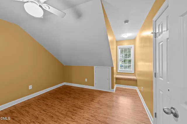 a backyard of a house with barbeque oven