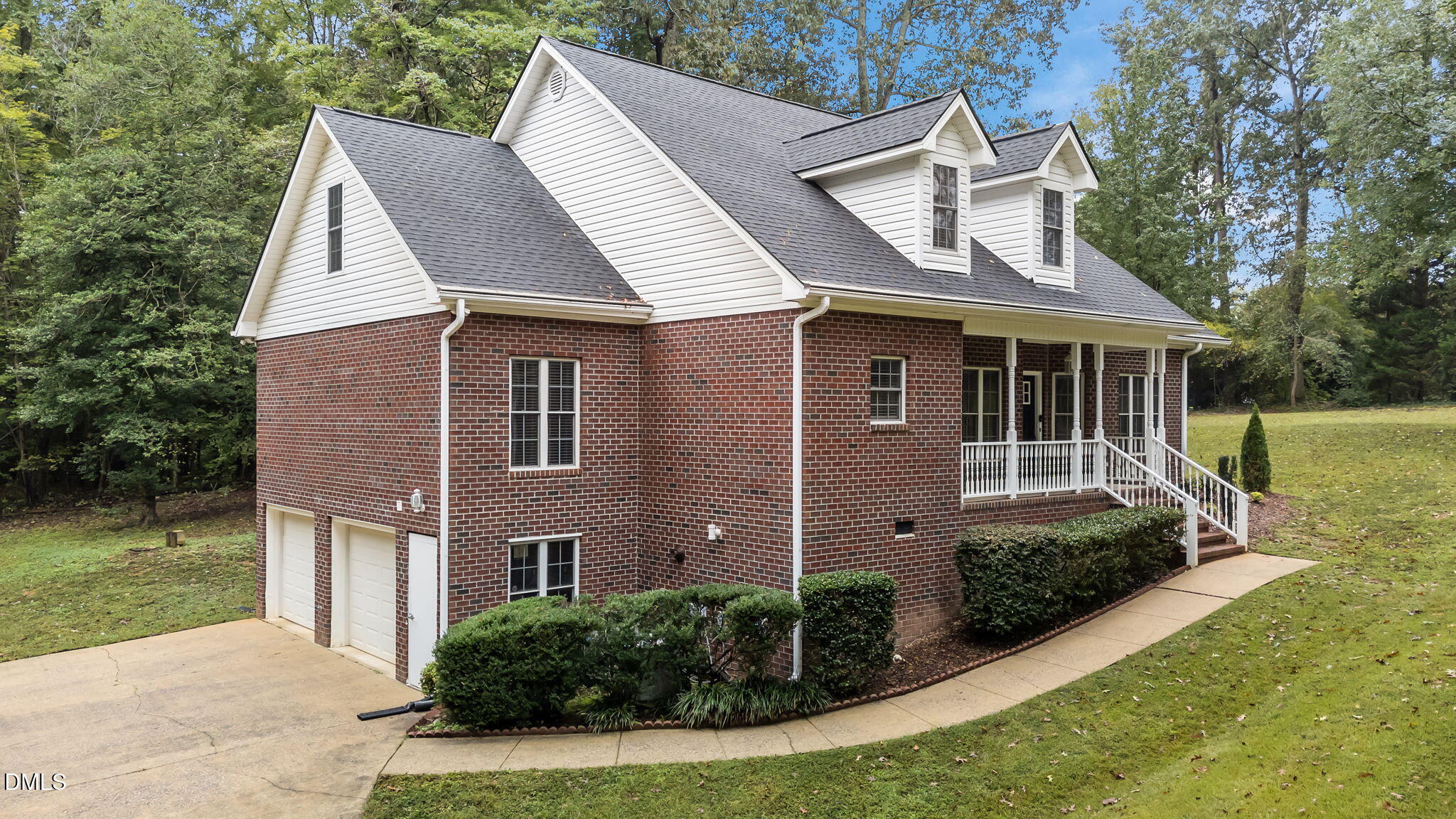 208 Adams Court Clayton, NC 27520 - Photo 4 of 63 a front view of a house with garden