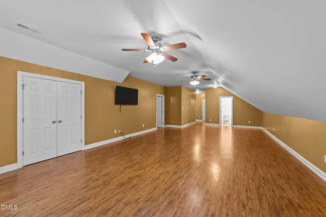 a backyard of a house with a street