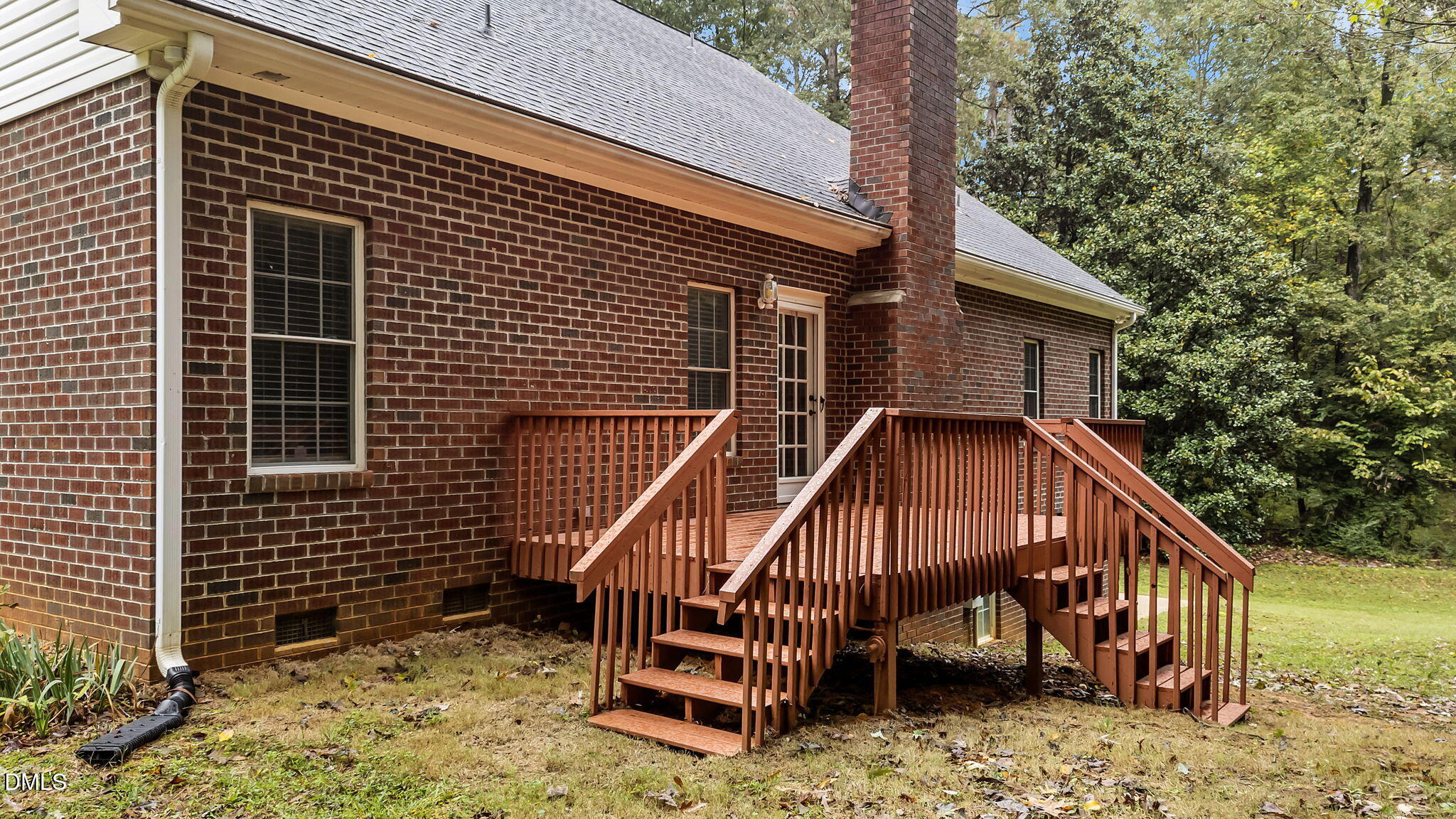 208 Adams Court Clayton, NC 27520 - Photo 48 of 63 a view of backyard with deck and seating space